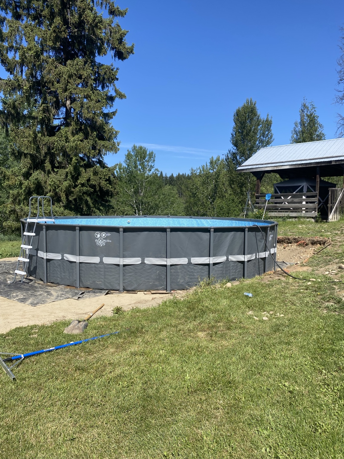 Finished landscaping, grading and pool site preparation